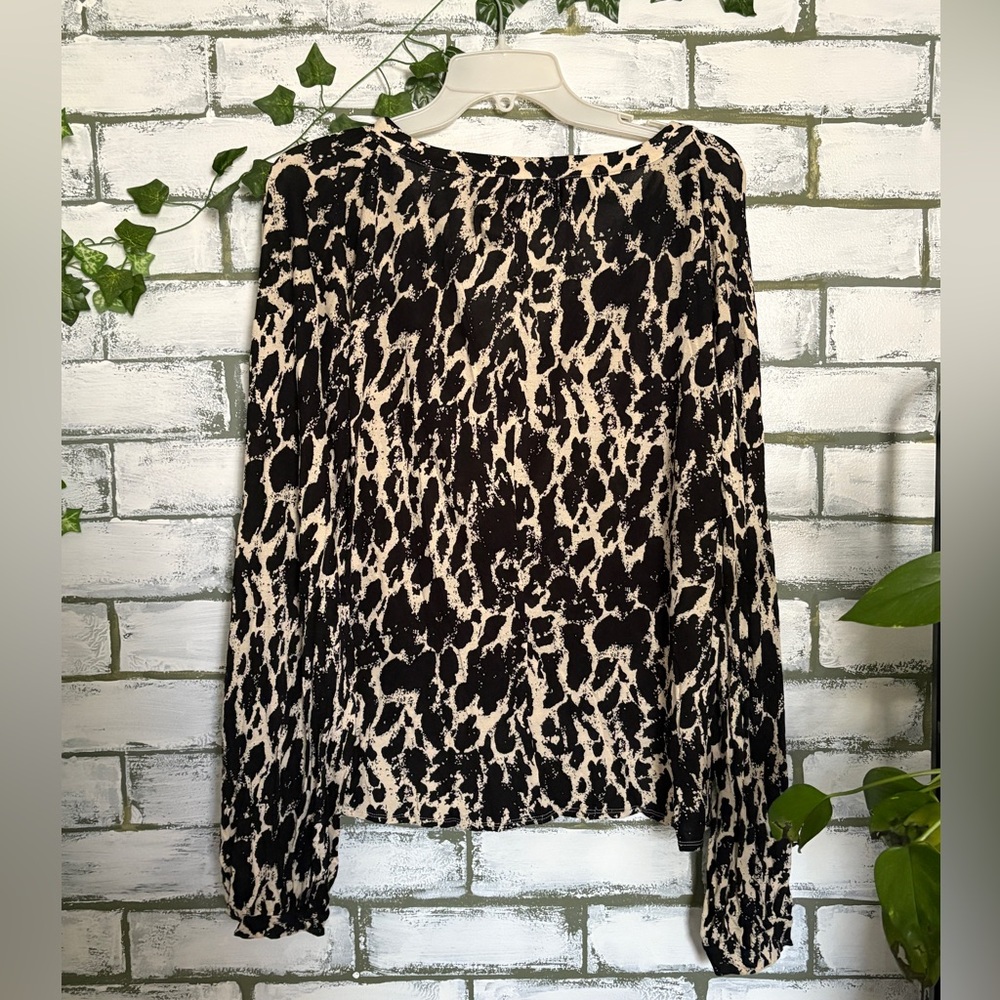 Urban Outfitters patterned blouse with bell sleeves